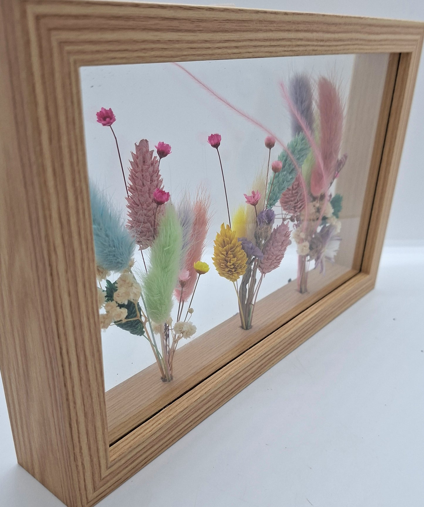 Droogbloemen in houten kader