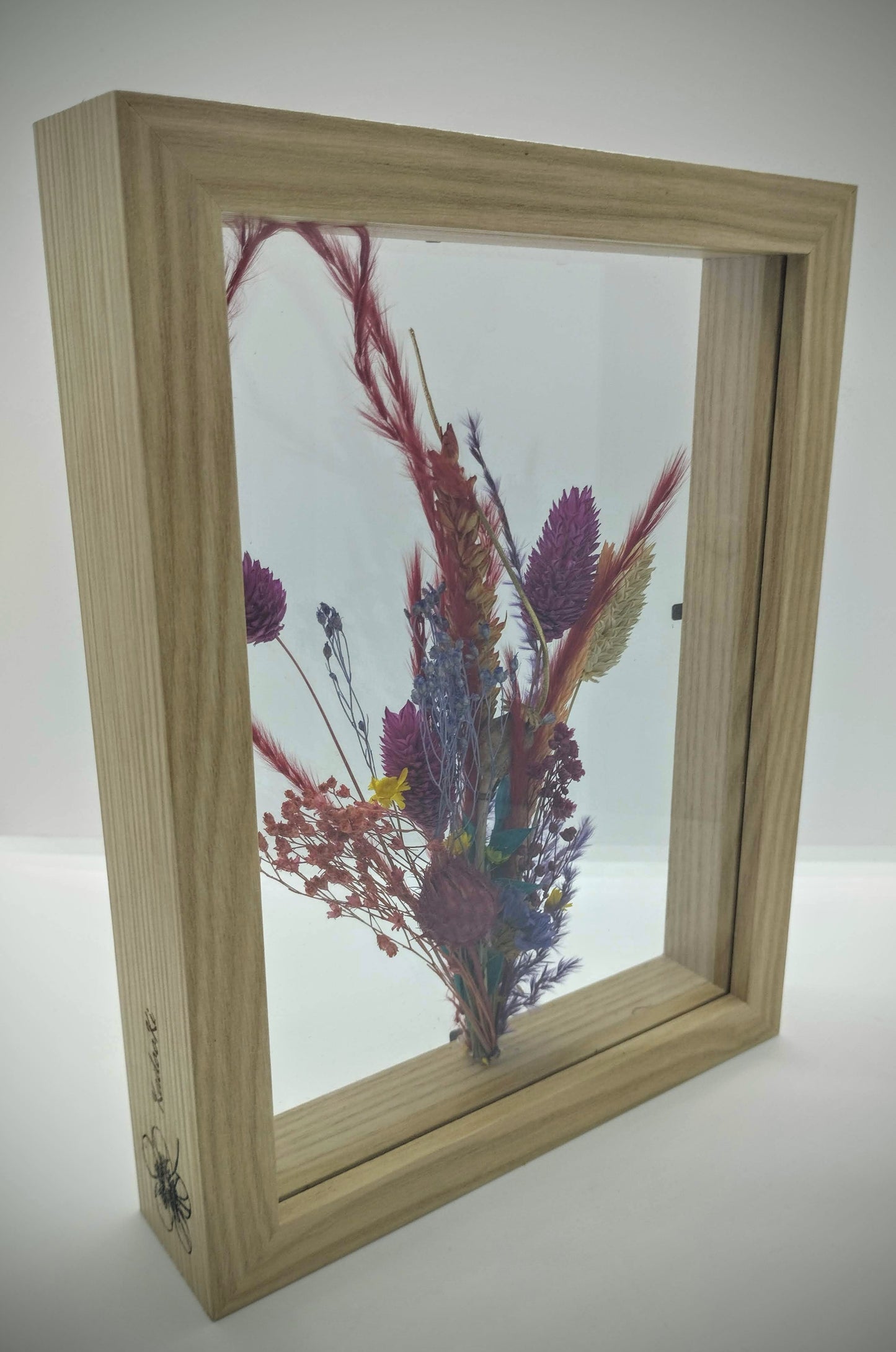 Droogbloemen in houten kader
