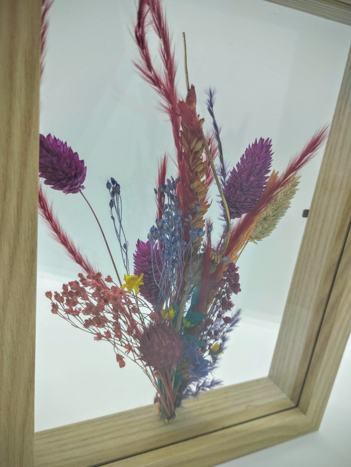 Droogbloemen in houten kader