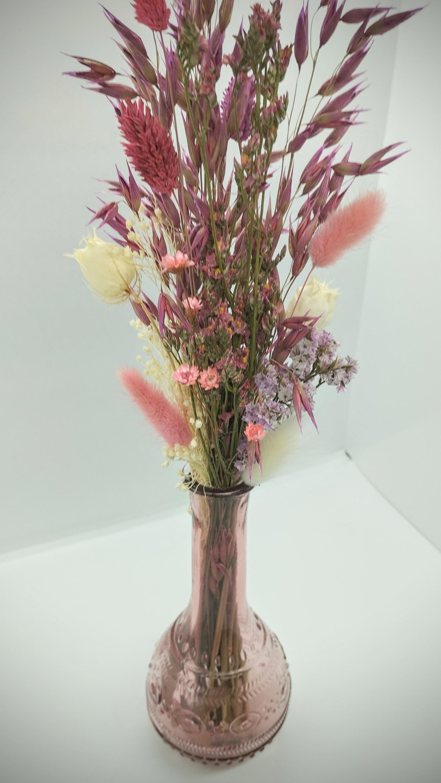 Droogbloemen in kleurrijk vaasje