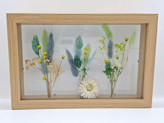 Droogbloemen in houten kader