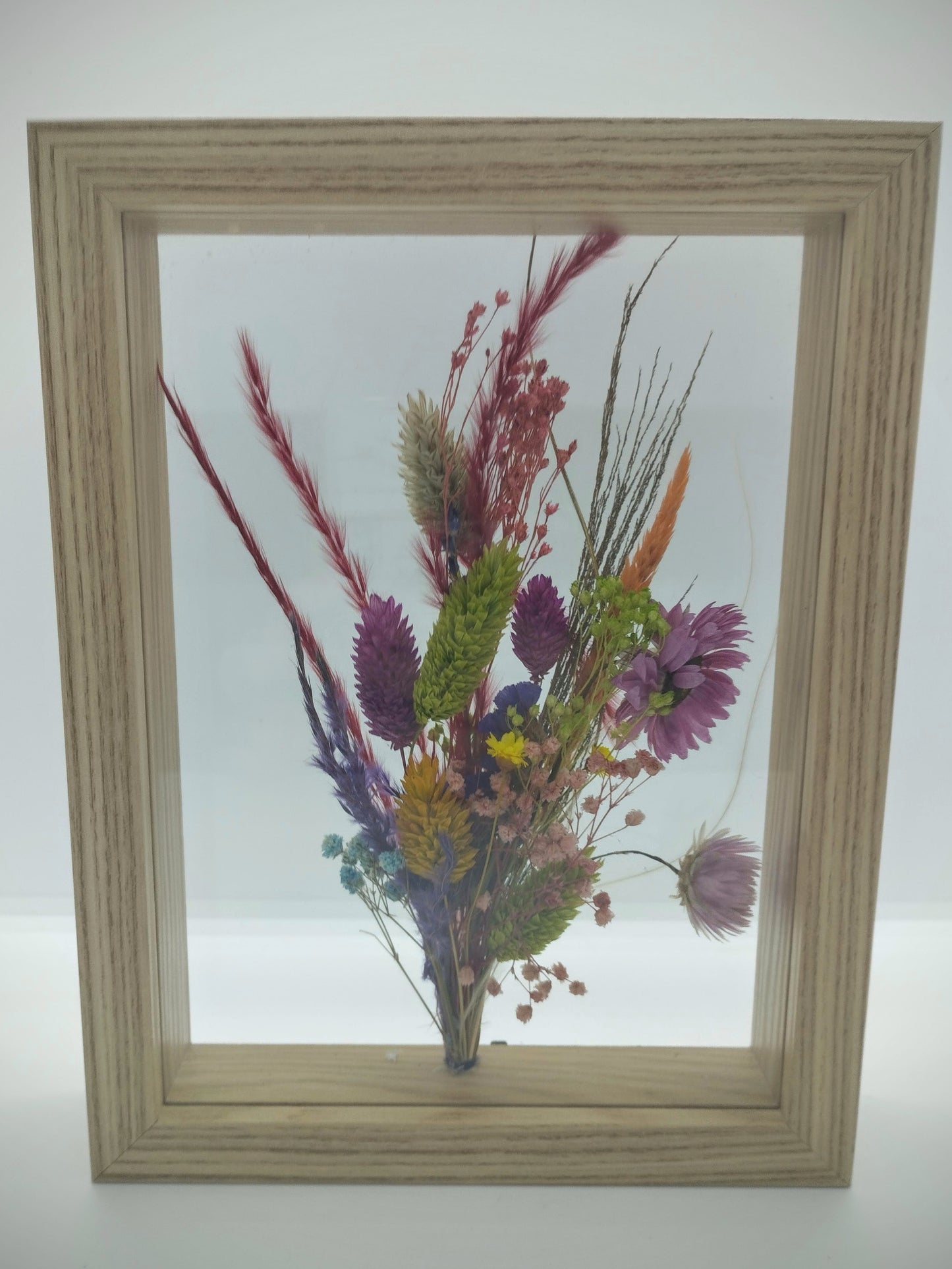 Droogbloemen in houten kader