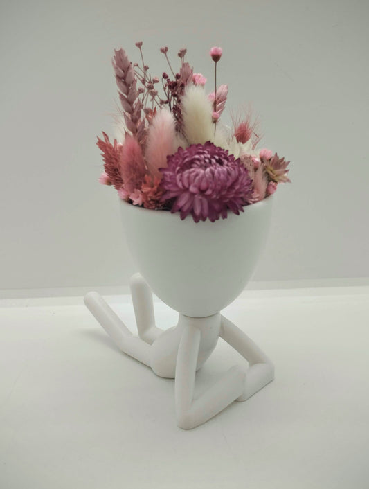 Plantenpotje mannetje met droogbloemen