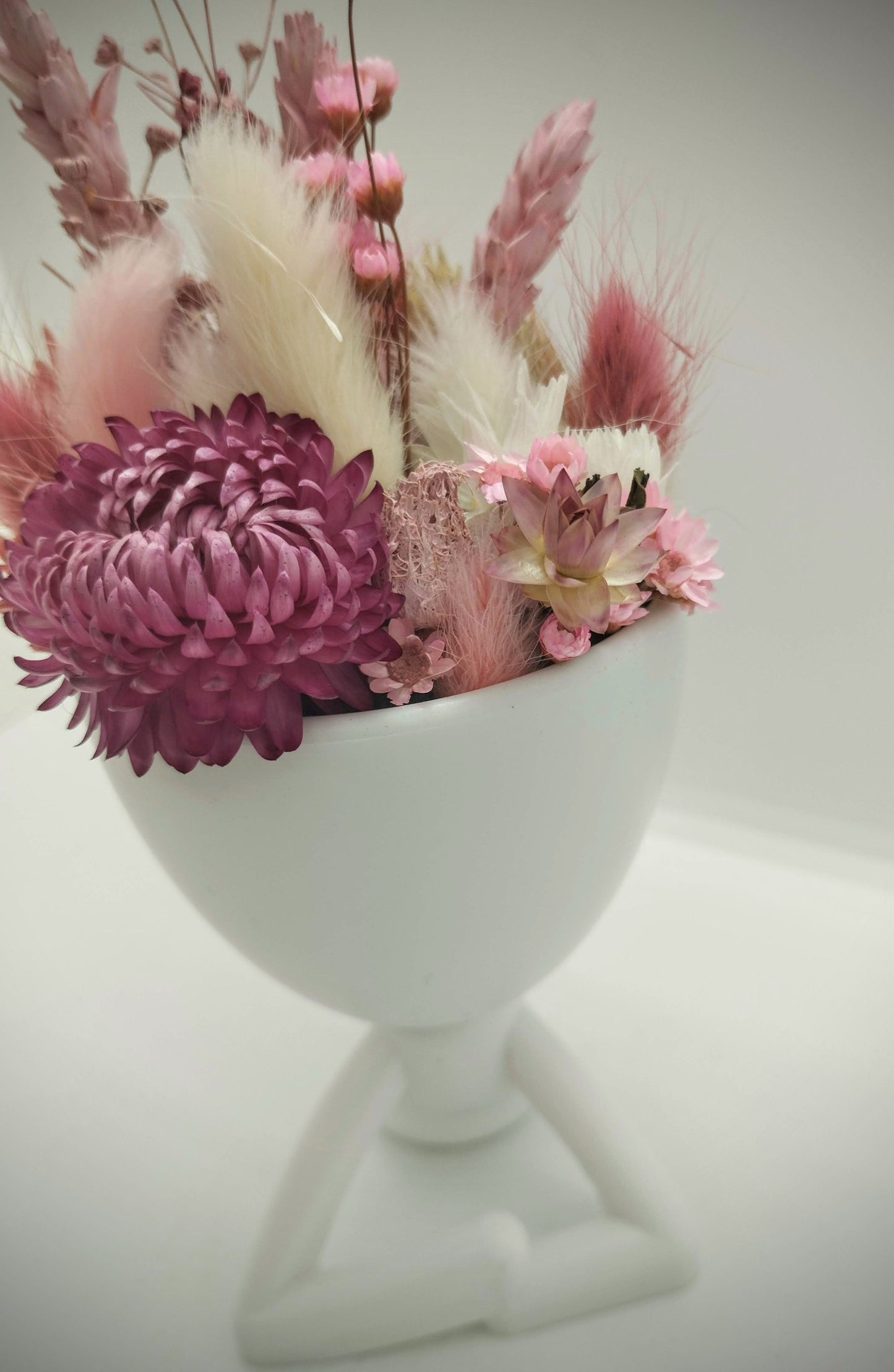 Plantenpotje mannetje met droogbloemen