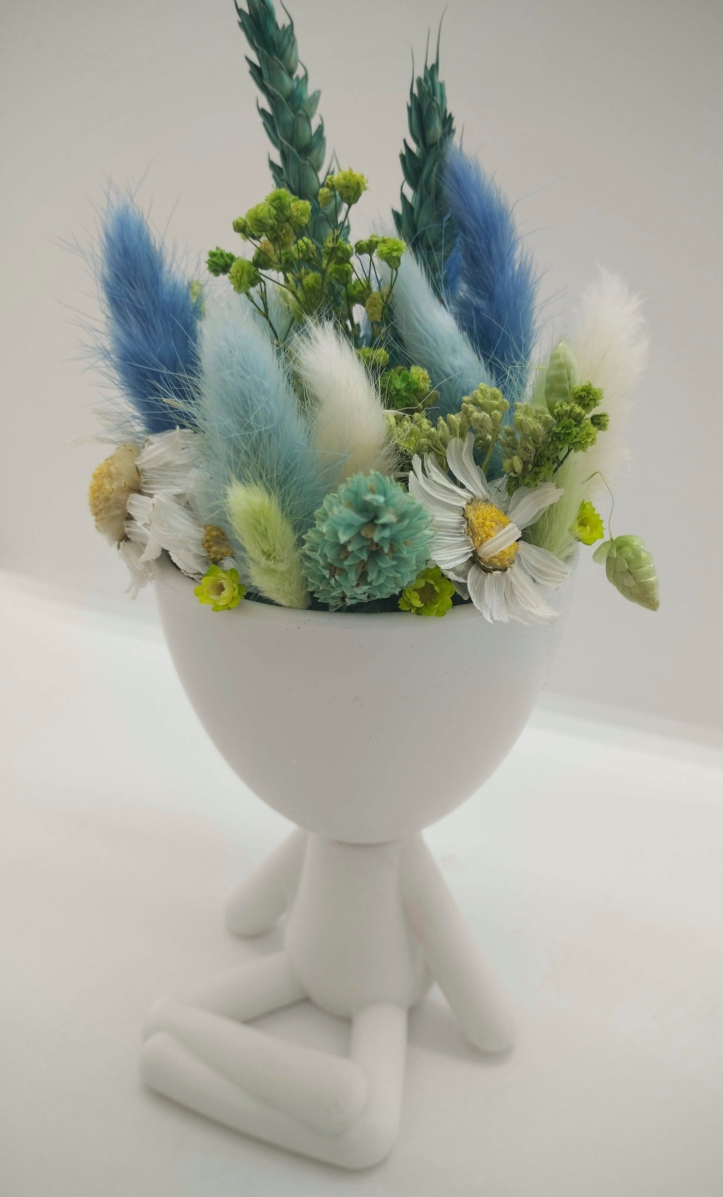 Plantenpotje mannetje met droogbloemen