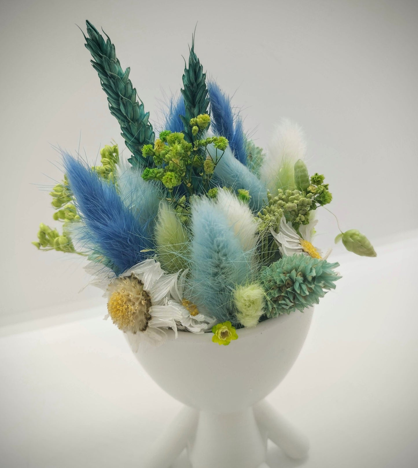 Plantenpotje mannetje met droogbloemen