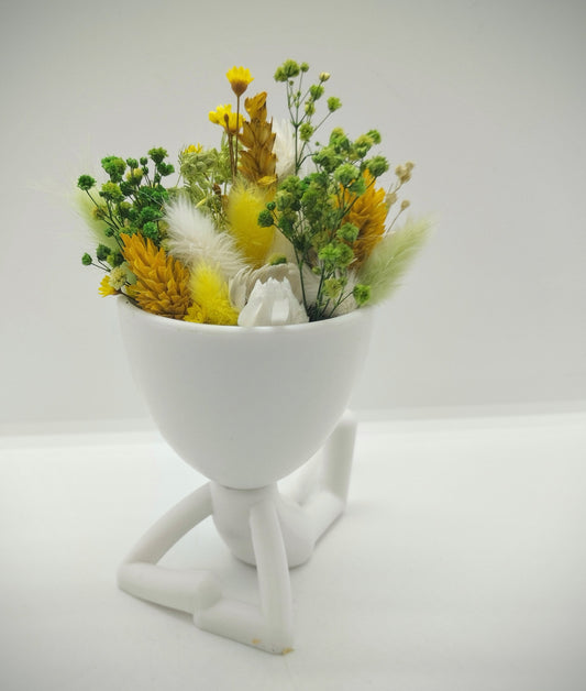 Plantenpotje mannetje met droogbloemen
