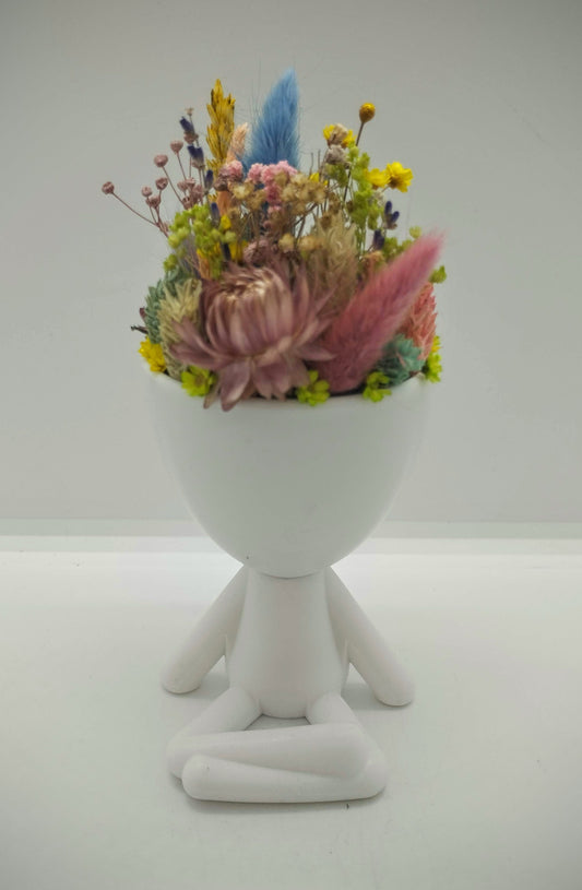Plantenpotje mannetje met droogbloemen