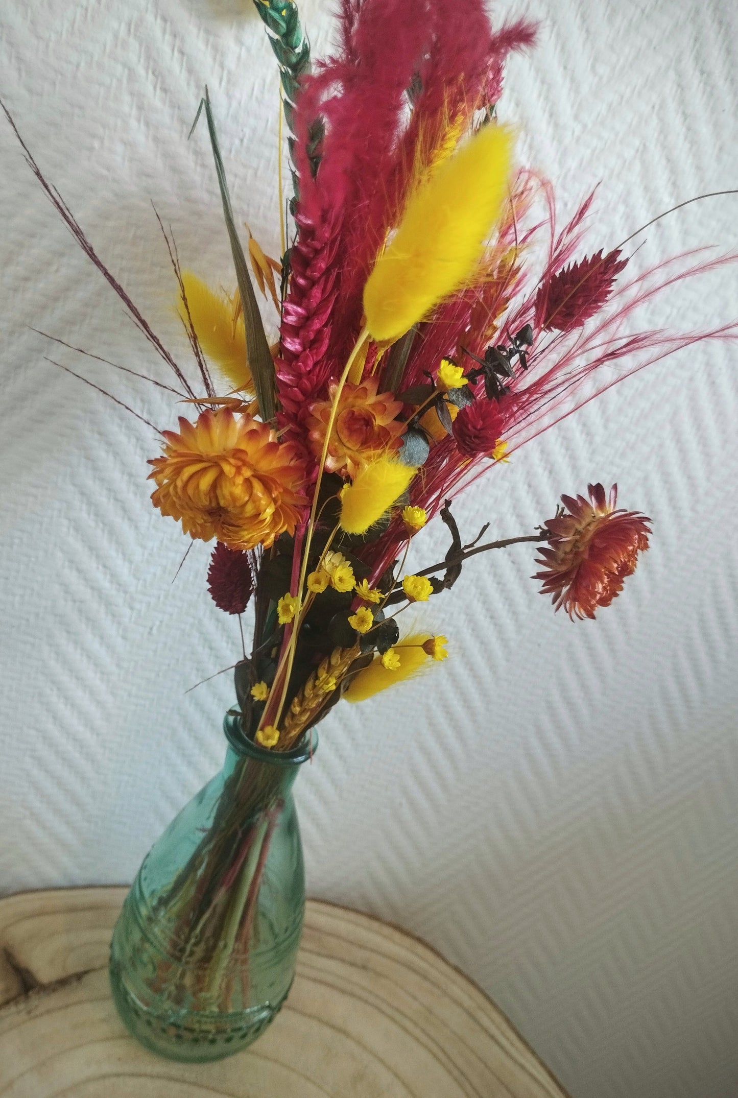 Droogbloemen in kleurrijk vaasje