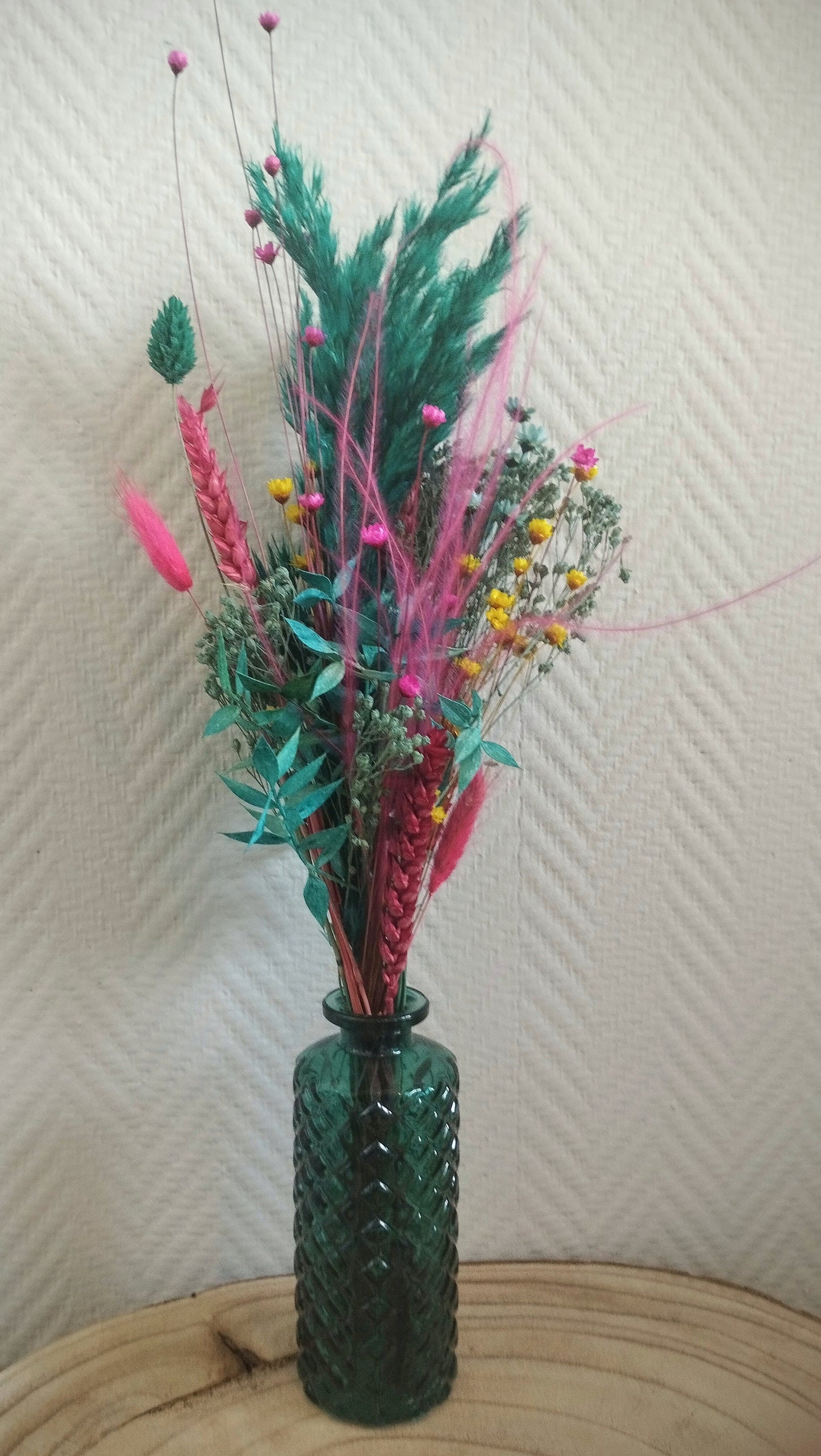 Droogbloemen in kleurrijk vaasje