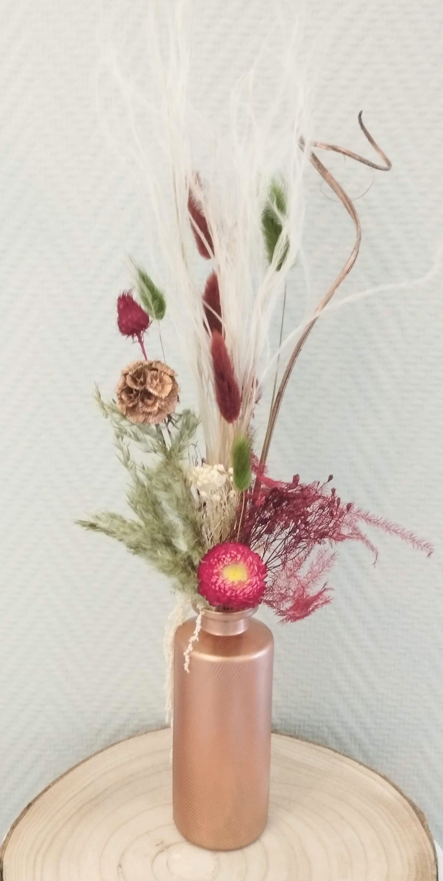 Droogbloemen in kleurrijk vaasje