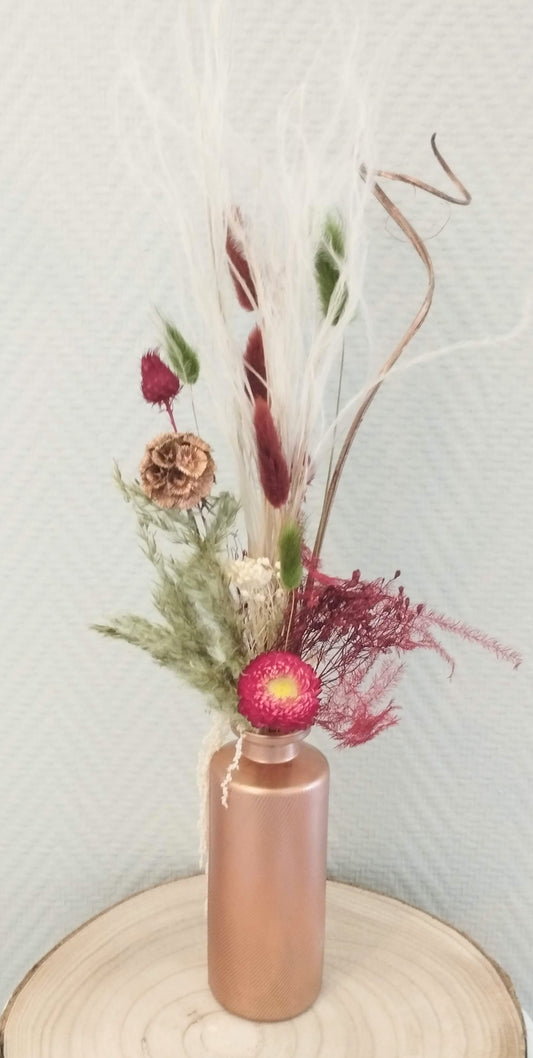 Droogbloemen in kleurrijk vaasje