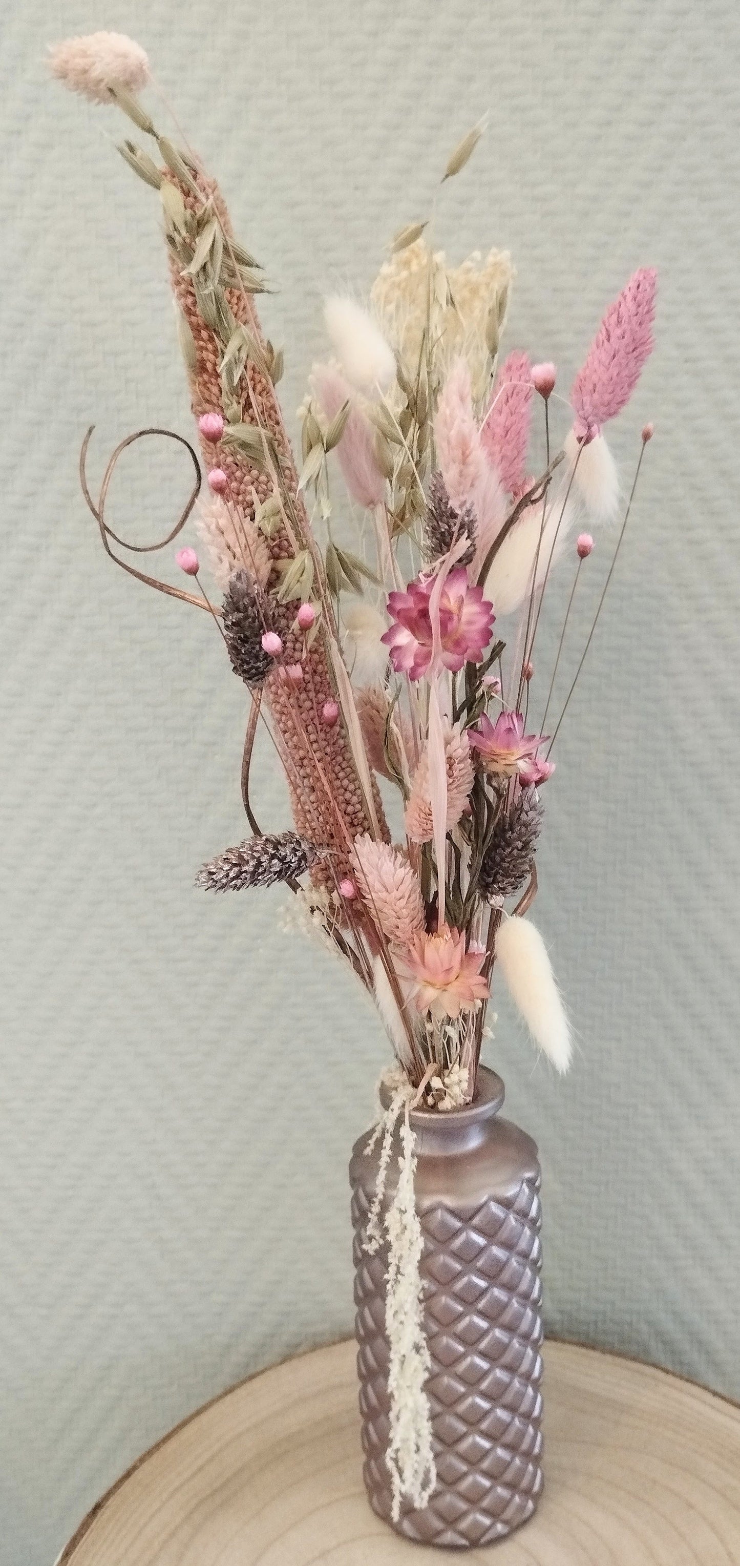 Droogbloemen in kleurrijk vaasje