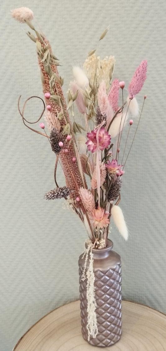 Droogbloemen in kleurrijk vaasje