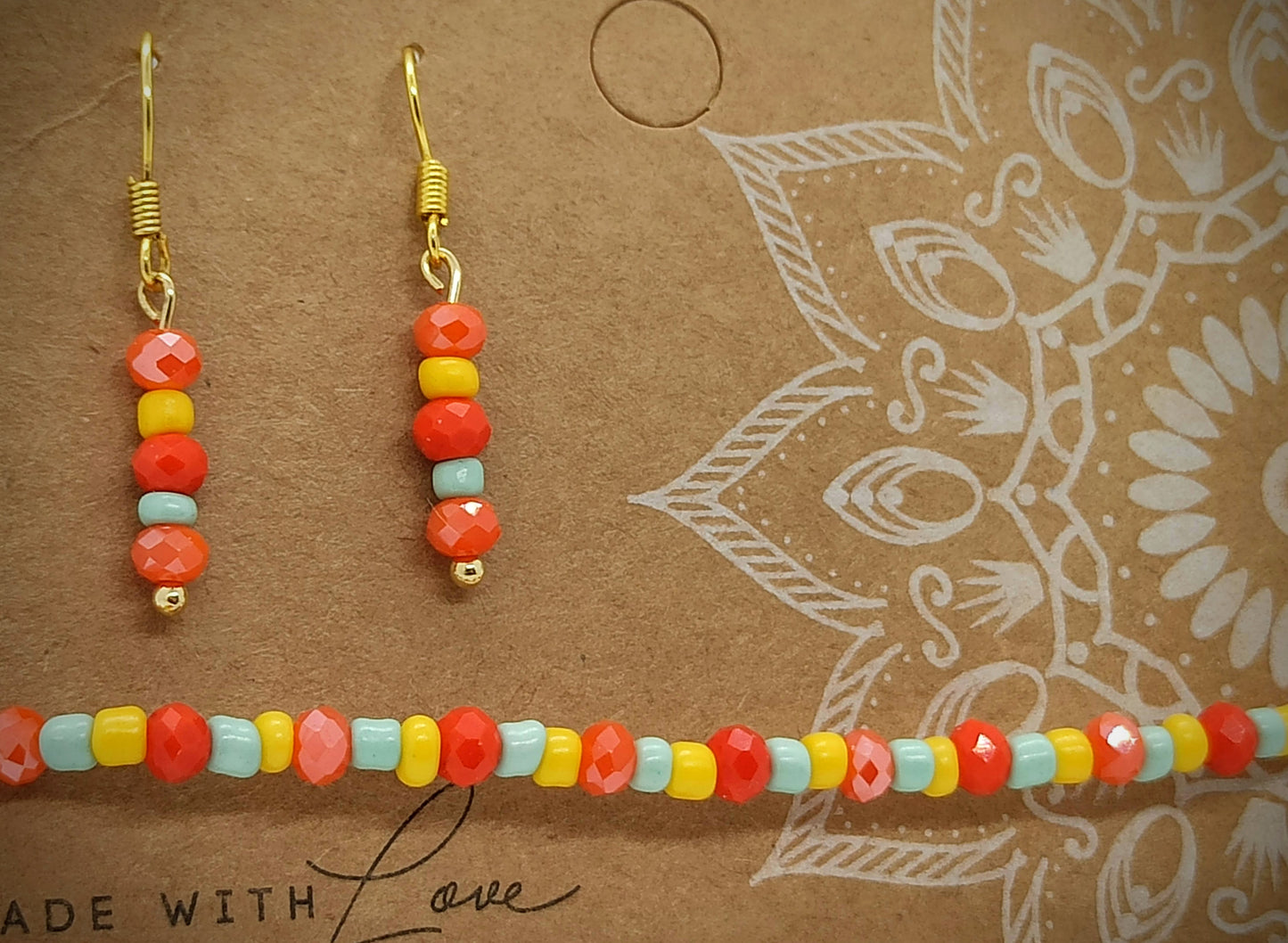 Kralen Armbandje (Orange) met bijpassend oorbellensetje - hangertjes (Zilver/RVS)