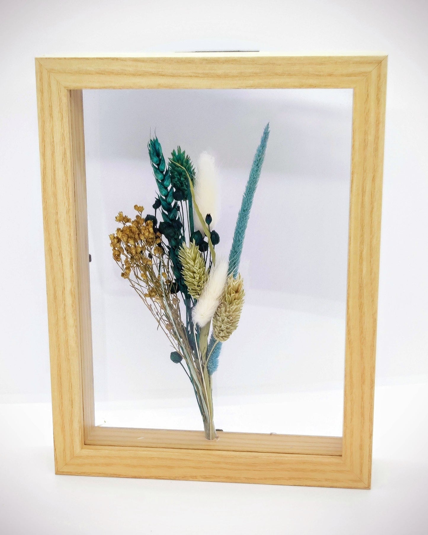 Droogbloemen in houten kader