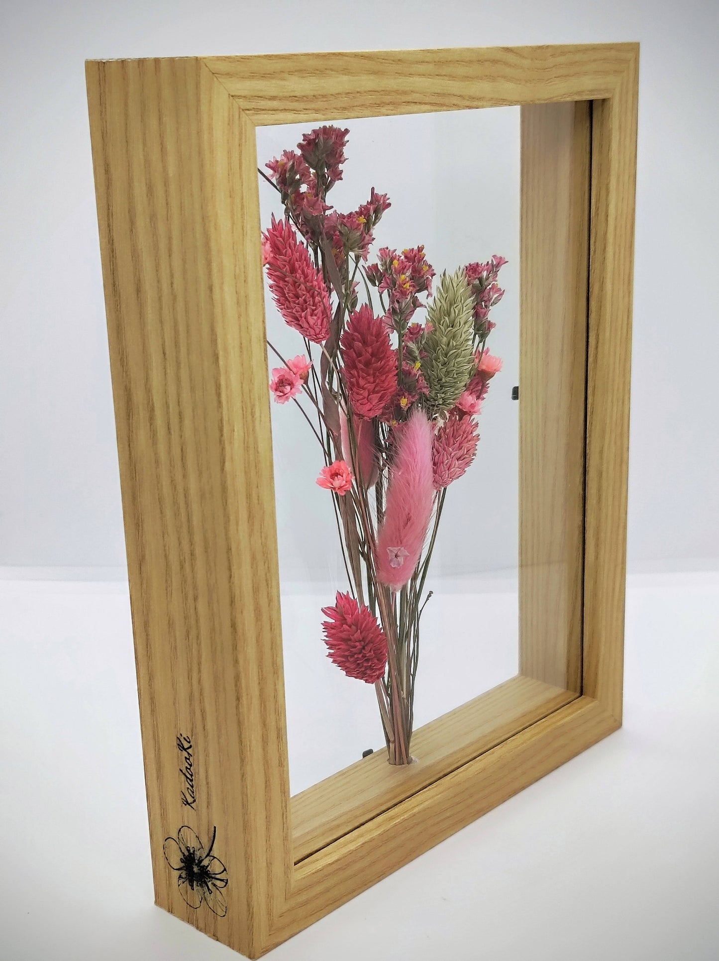 Droogbloemen in houten kader
