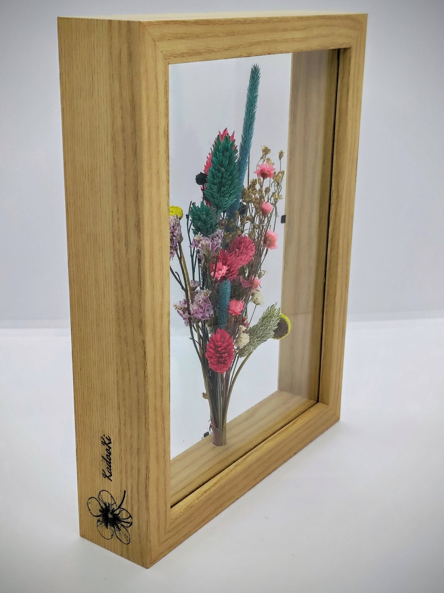 Droogbloemen in houten kader