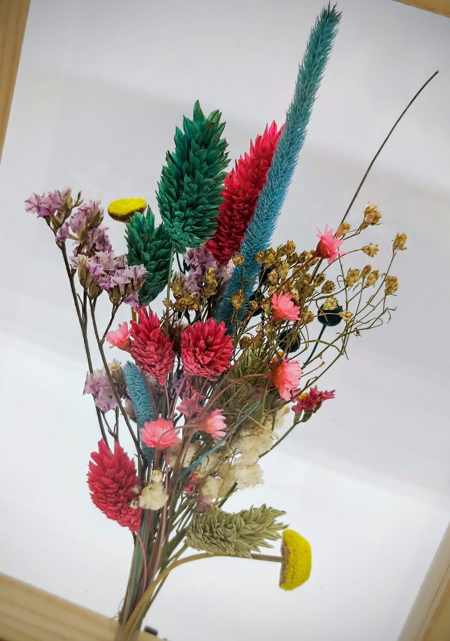 Droogbloemen in houten kader