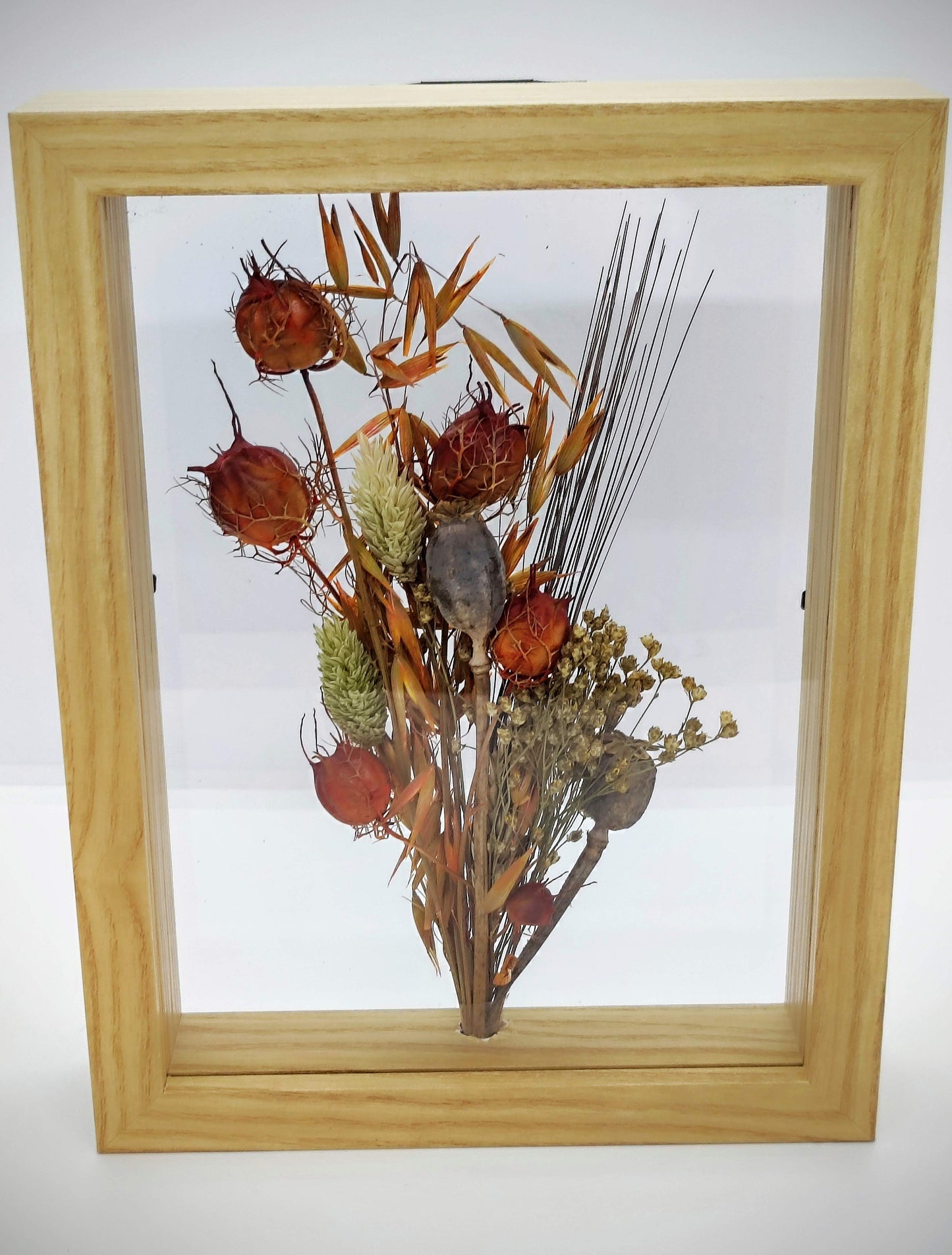 Droogbloemen in houten kader
